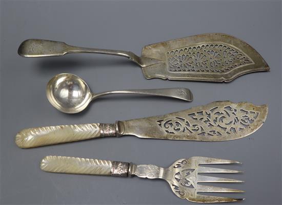 A pair of late Victorian silver fish servers, Sheffield, 1898, a William Iv silver fish slice and a silver sauce ladle.